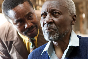 Maruge (Oliver Litondo) and Mr Kipruto (Vusumuzi Michael Kunene)