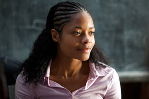 Jane (Naomie Harris) listens to a letter being read out aloud